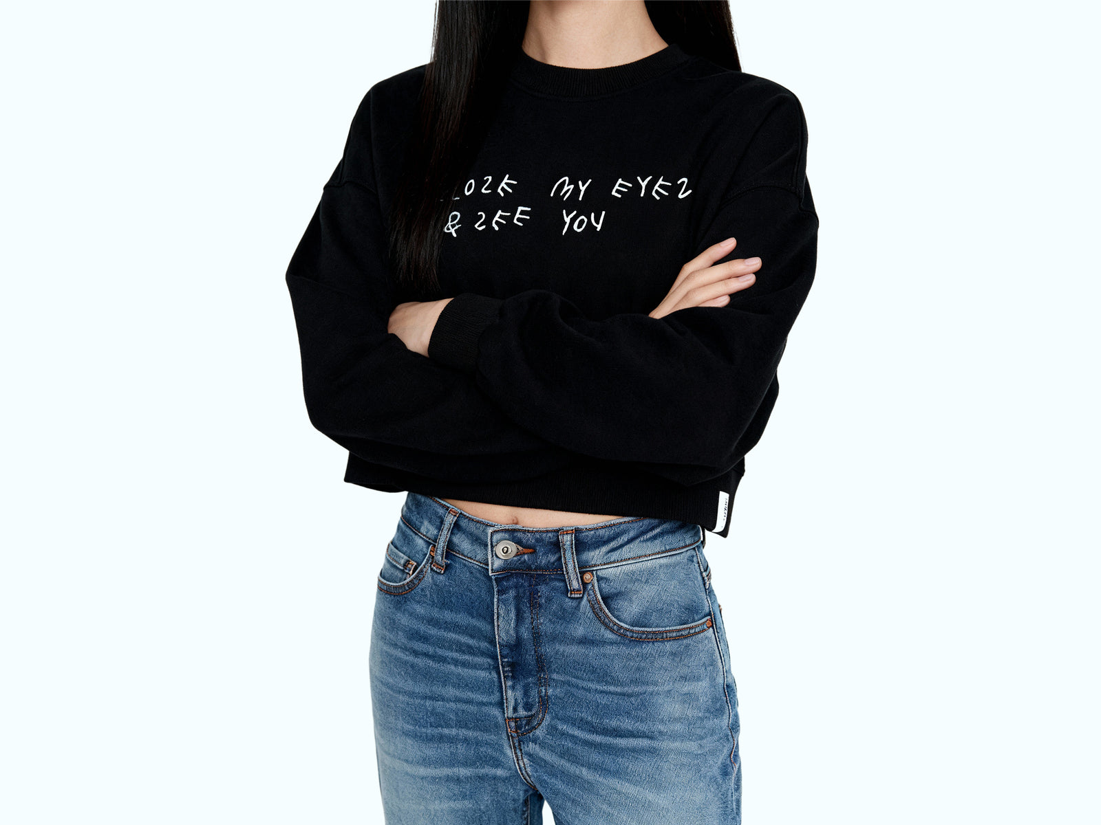 Black sweatshirt with Coco Capitán embroidery