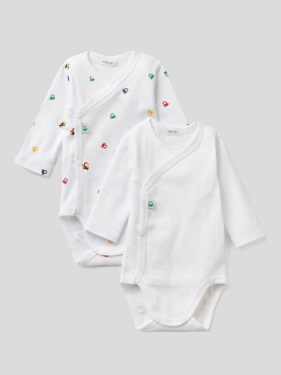 Two long sleeve bodysuits in organic cotton