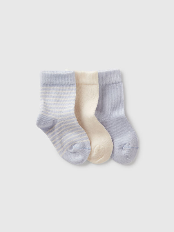 Three pairs of light blue and cream socks New Born (0-18 months)