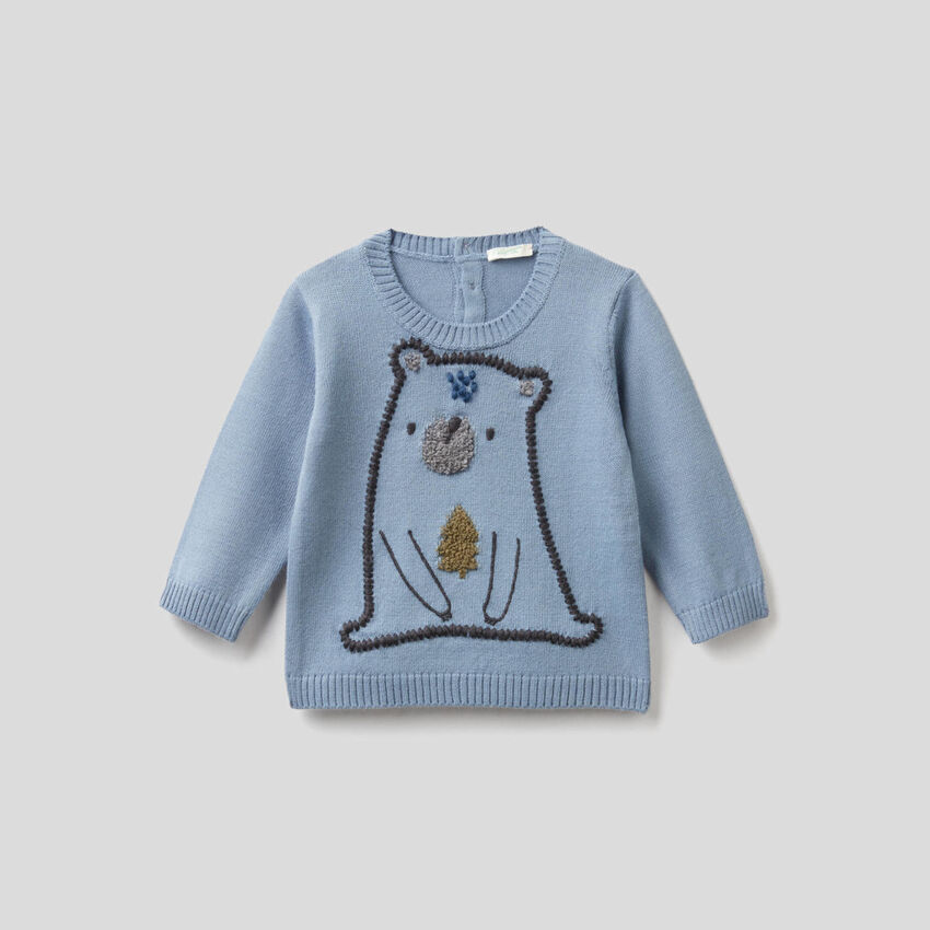 Tricot sweater with embroidered animal