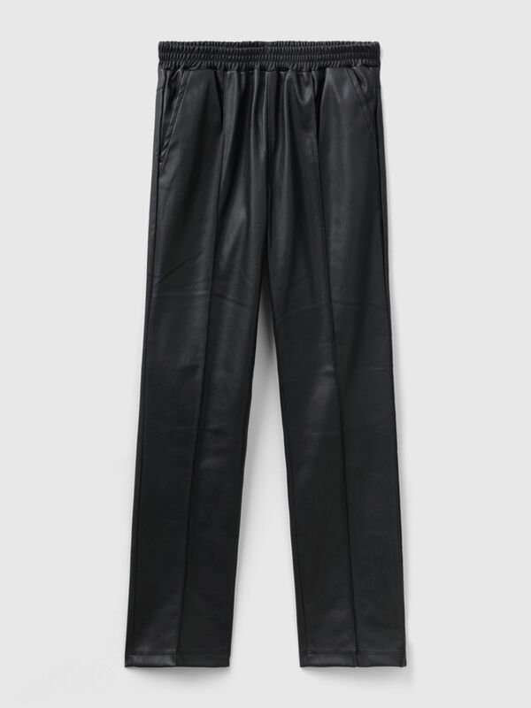 Slim fit trousers in imitation leather fabric