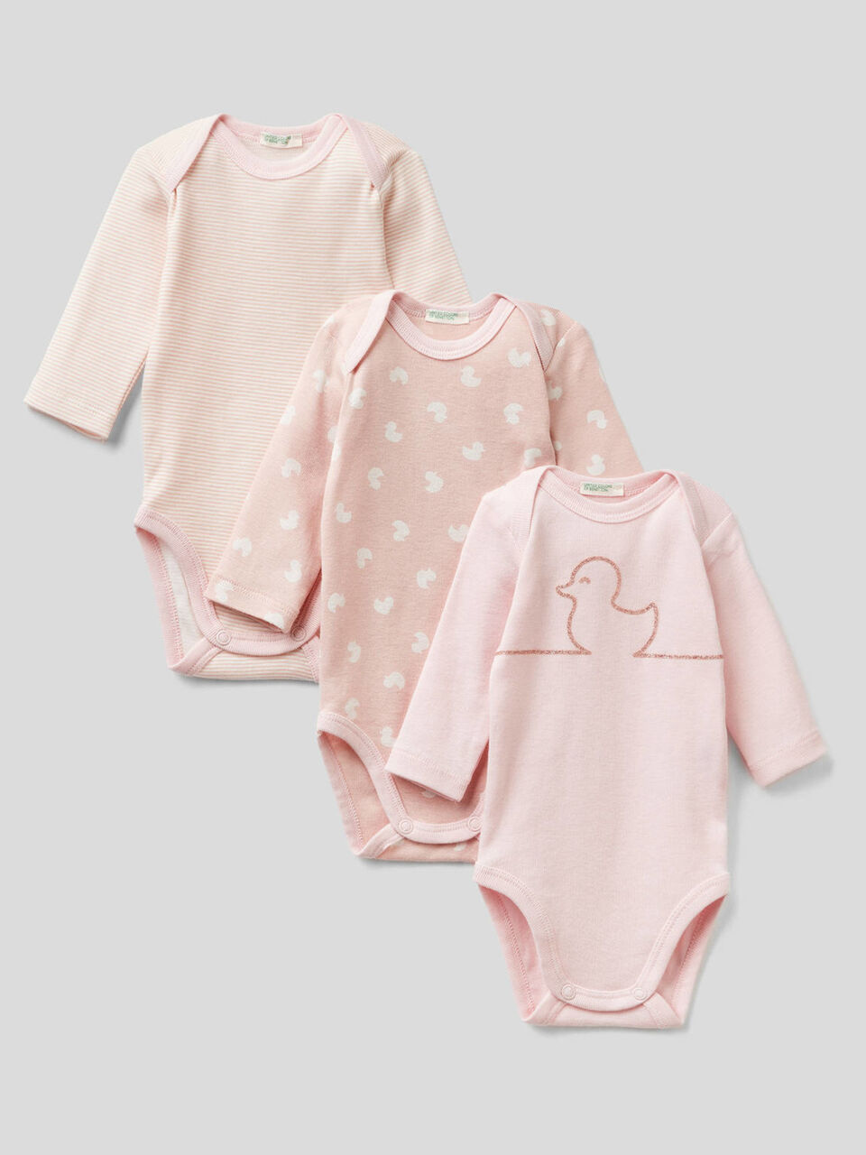 Three bodysuits in organic cotton image number 1